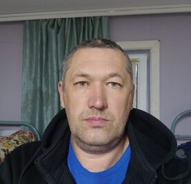 Николай