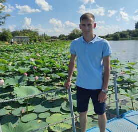 Николай